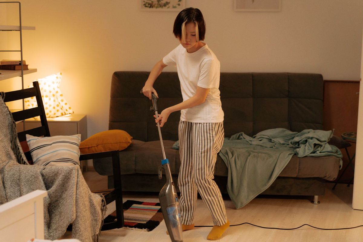 Professional cleaner preparing a welcoming Newhall family home